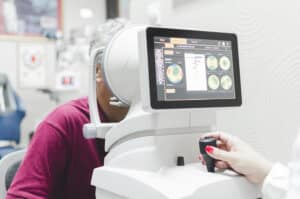 Eye specialist performing a detailed eye examination for eye floaters
