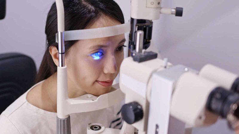 Woman having a slit-lamp eye screening at Asia Pacific Eye Centre