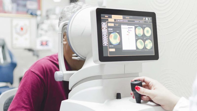 Eye specialist performing a detailed eye examination for eye floaters